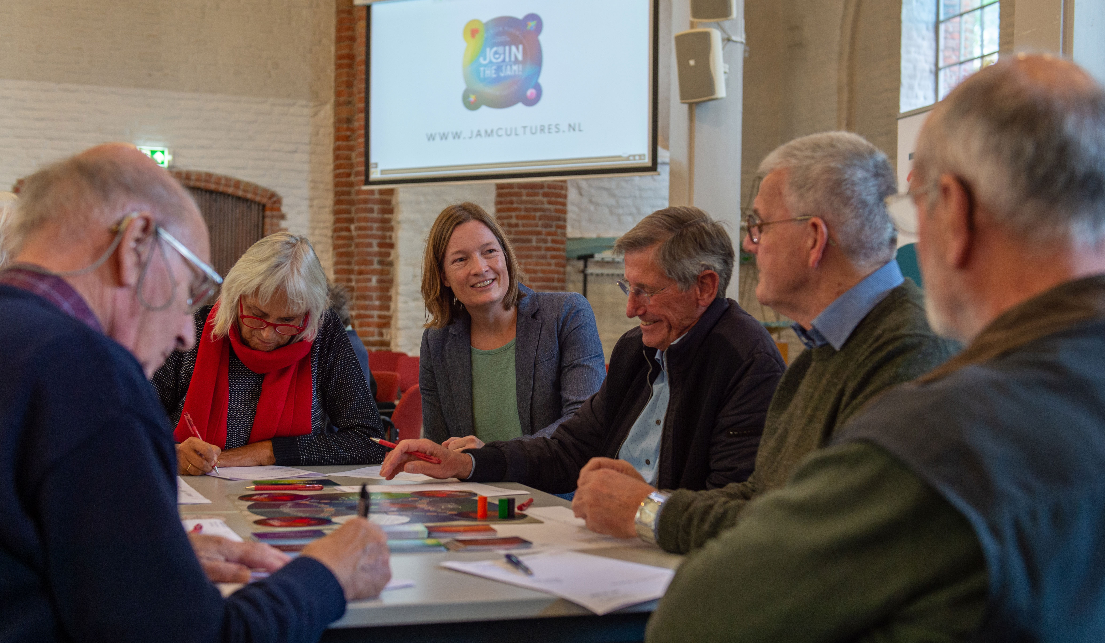 Deelnemers spelen het spel Join the Jam tijdens de workshop van Janneke de Wit van Erfgoed Zeeland. 