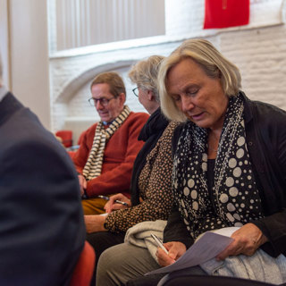 Meedenken tijdens een interactief onderdeel van de middaglezing over Kunst en cultuur op recept.