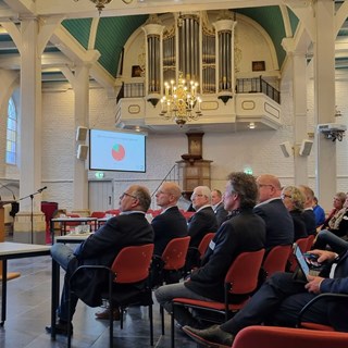 Projectleider Jan van de Voorde vertelt over de uitkomsten van de kerkenvisies.