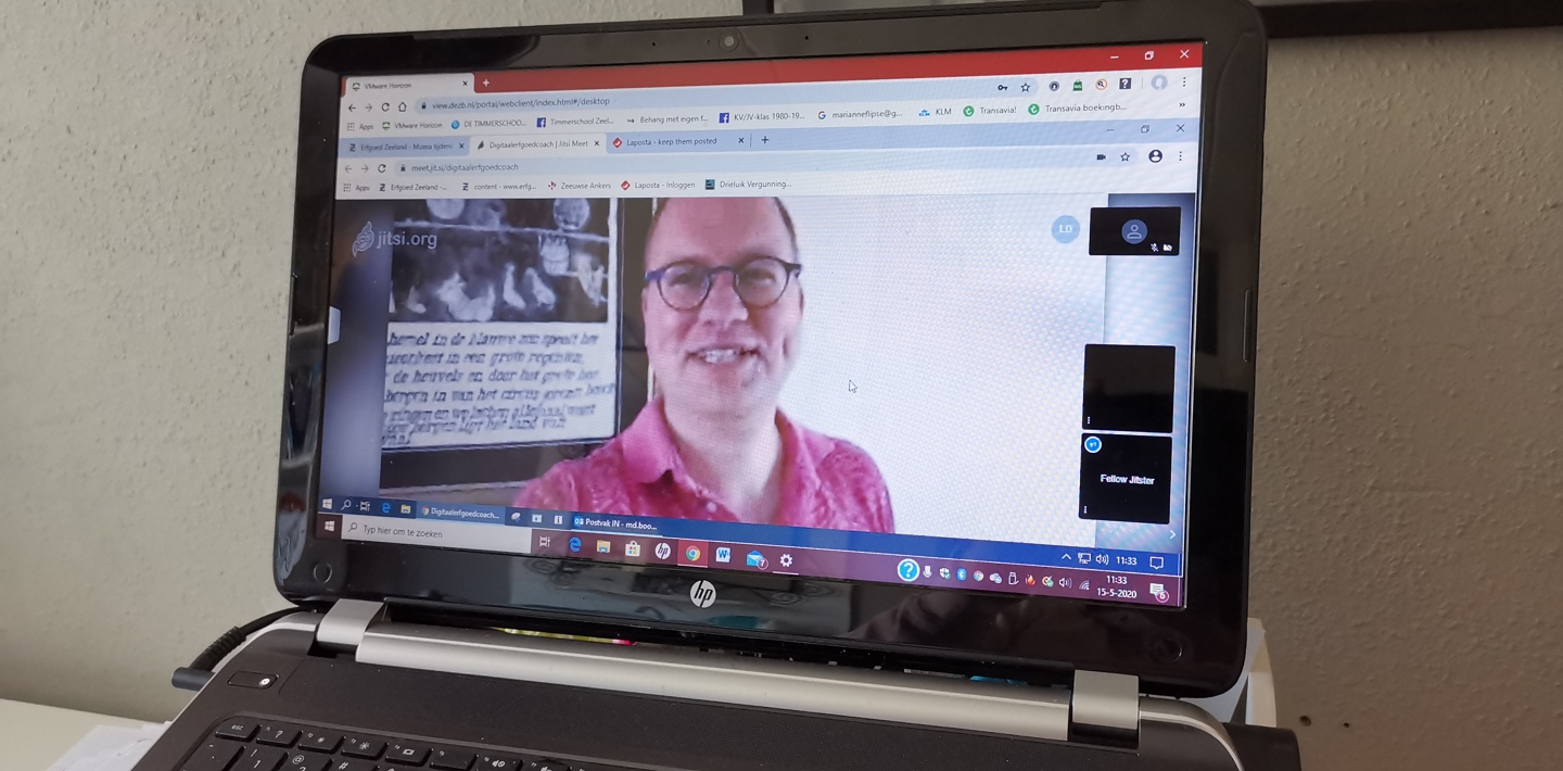 Een laptop met daarop het digitaal inloopspreekuur van de digitaal erfgoed coach van Erfgoed Zeeland.